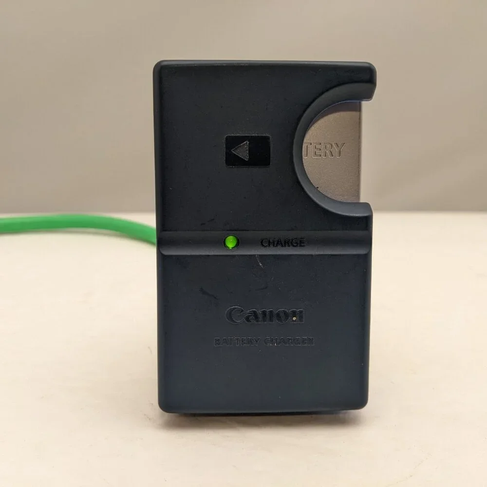 CANON CB-2LS Charger & Digital Concepts BP-1LHCL Rechargeable Li-Ion Pack USED
